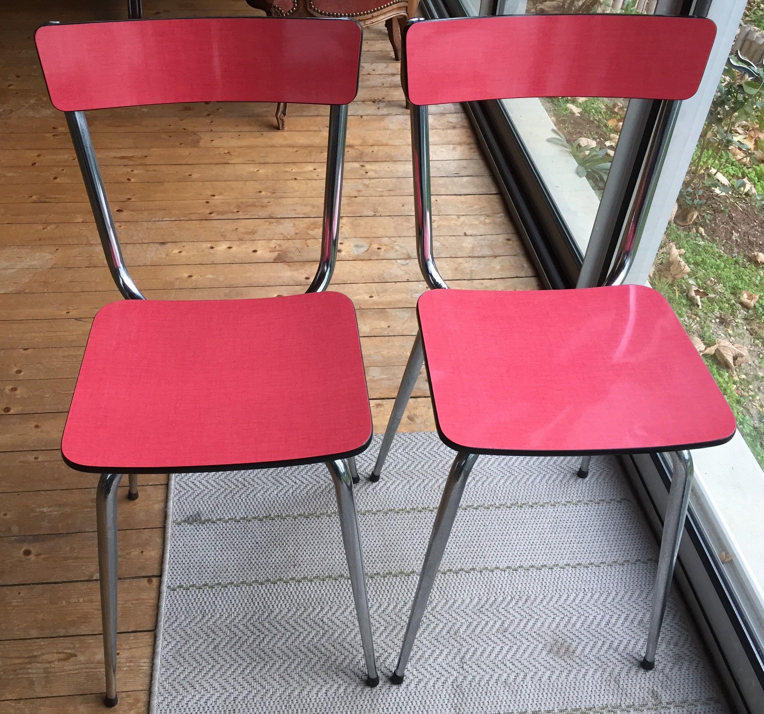Table set and 2 vintage vintage pale red formica chairs