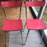 Table set and 2 vintage vintage pale red formica chairs