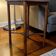 Vintage high wooden plant/side table/shelf in brown.