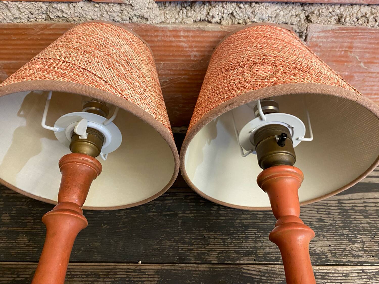 Pair of antique turned wood bedside lamps with push button switch
