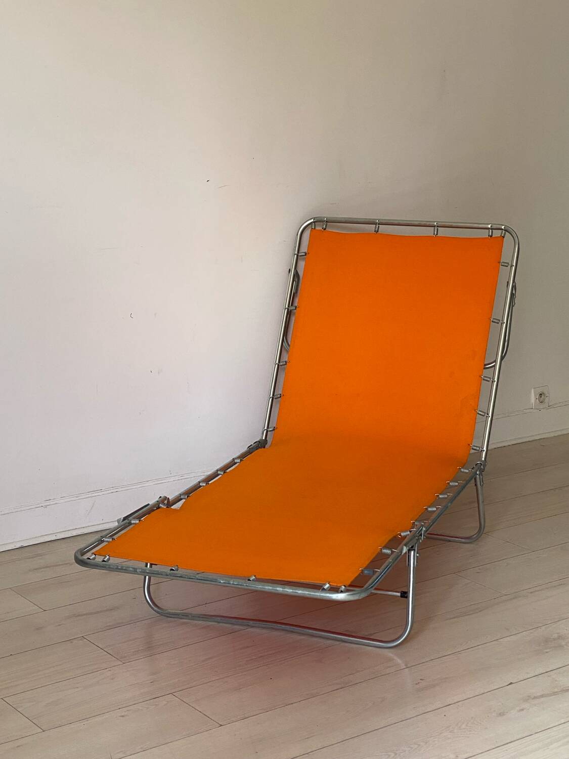 Orange and metal deckchair 1970