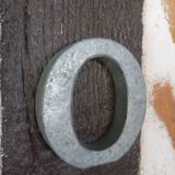 Letter O in zinc