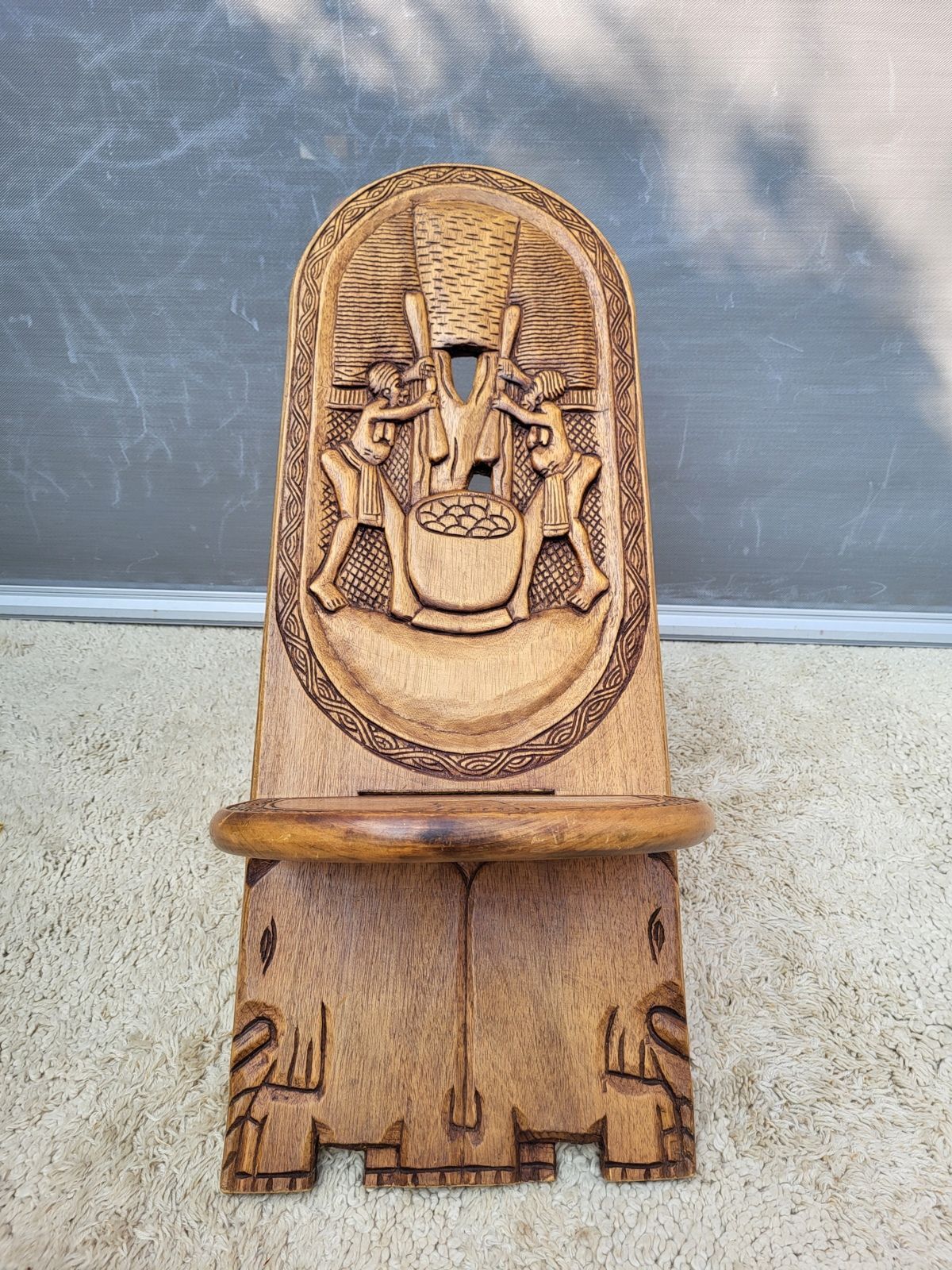 Chaise africaine bois sculpté escamotable