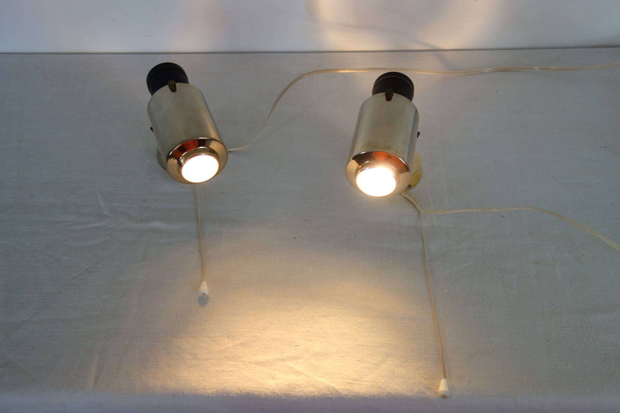 2 Zodiac wall lights by Jacques Biny from the 1950s.
