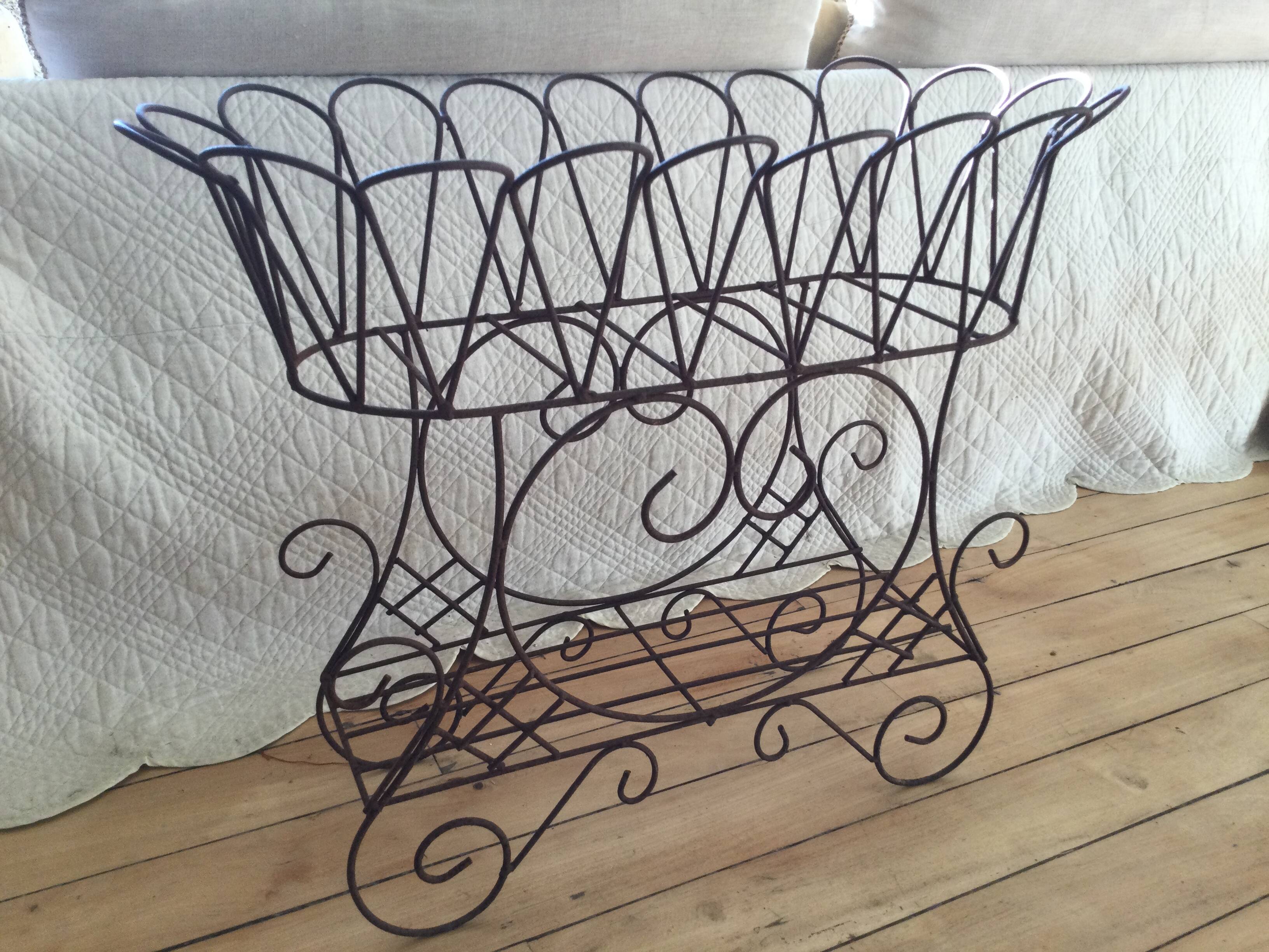 Antique iron plant stand