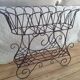 Antique iron plant stand