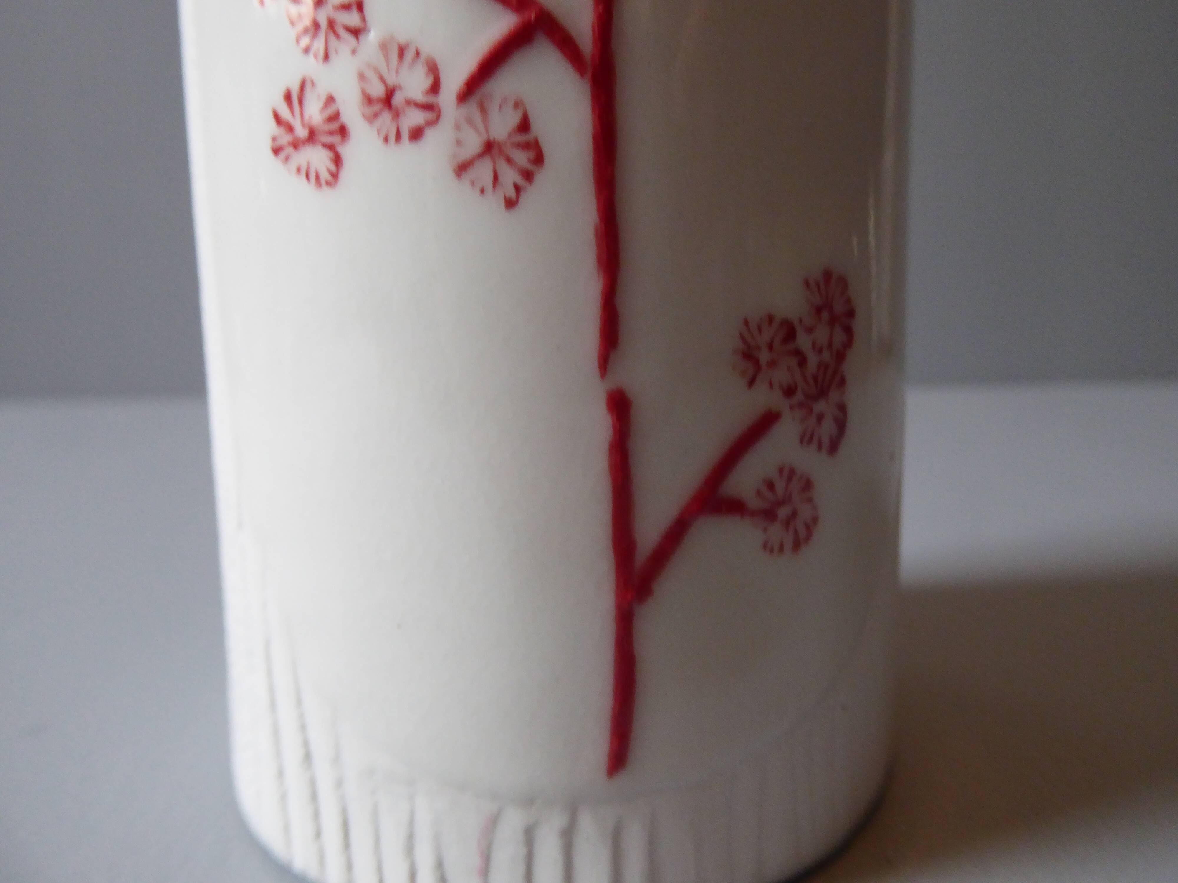 Porcelain vase and biscuit decorated with flowers
