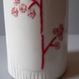 Porcelain vase and biscuit decorated with flowers