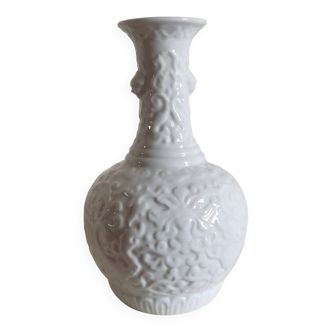 20th century "Chinese white" porcelain baluster vase with pierced base
