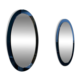 Rare pair of Italian blue oval mirrors, attributed to Cristal Arte, 1970s