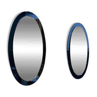 Rare pair of Italian blue oval mirrors, attributed to Cristal Arte, 1970s