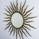 French sunburst starburst mirror in gilt iron, 1950s