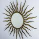 French sunburst starburst mirror in gilt iron, 1950s