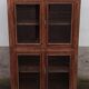 Old wooden glazed cabinet with four doors