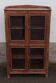 Old wooden glazed cabinet with four doors