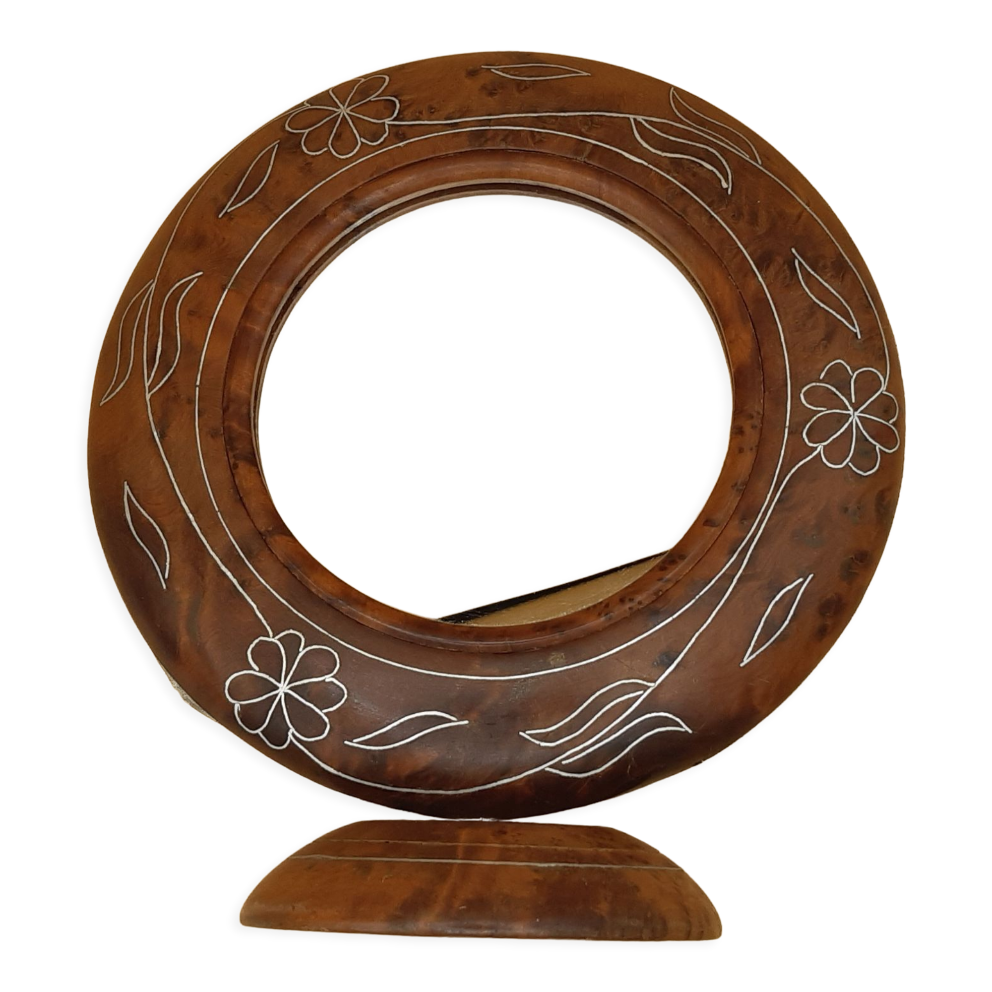 Antique mirror on wooden stand and metal net