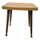 Side table with compass legs