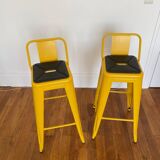 Pair of yellow Tolix high chairs