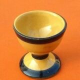 Antique glazed terracotta egg cup