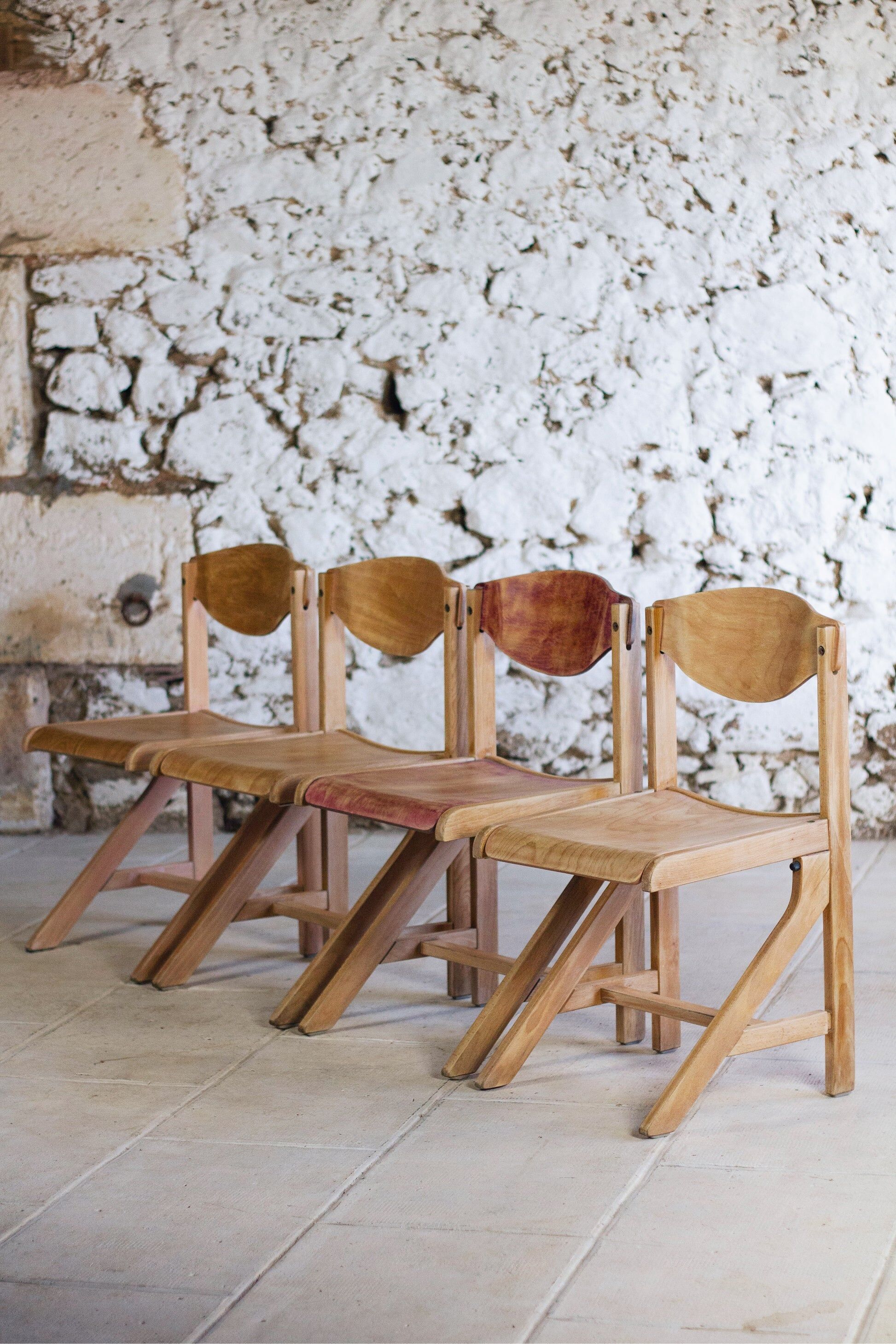 4 vintage canteen chairs in beech, 1980.