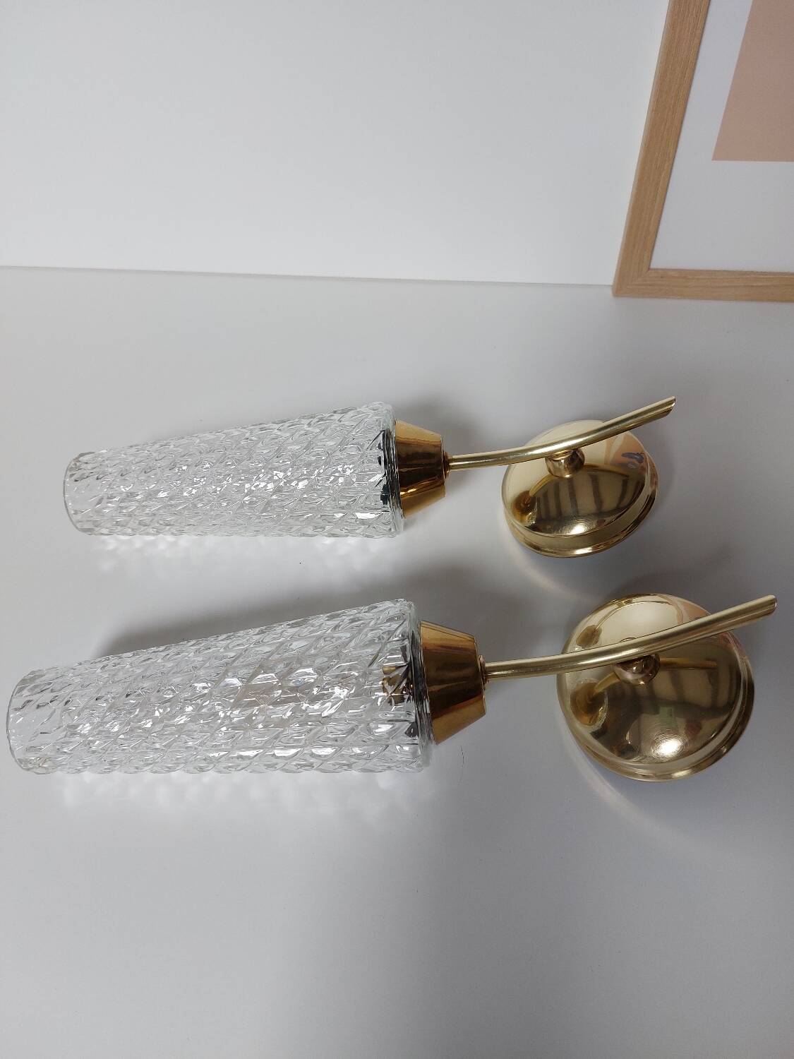 Pair of brass and glass wall lights