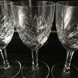 Crystal cut water stemmed glasses. Star and leaf patterns.