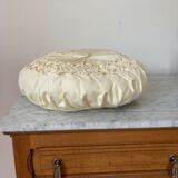 Cushion in beige fabric