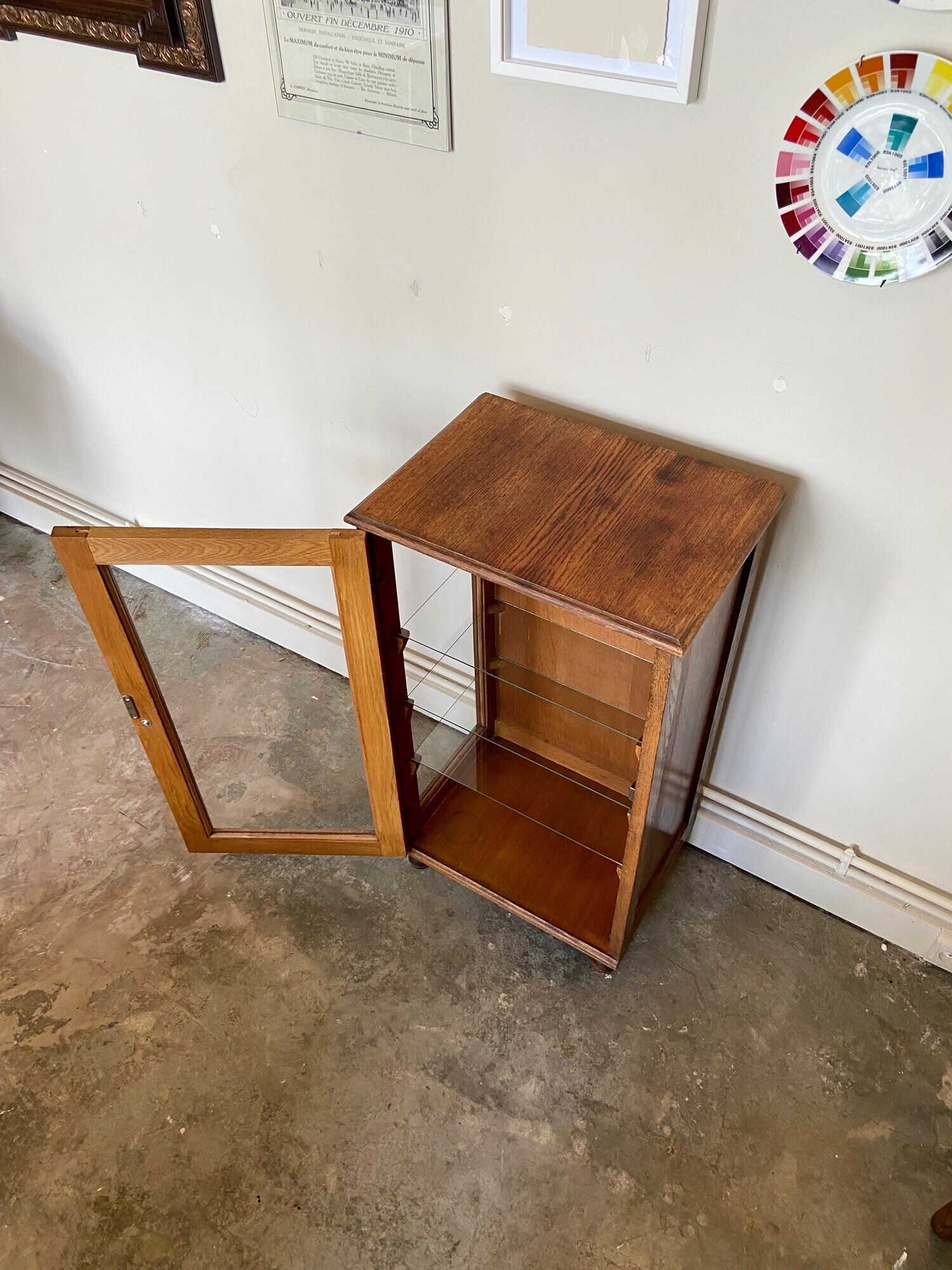 Dark wood display case and transparent glass