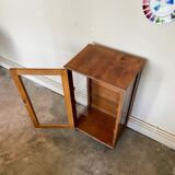 Dark wood display case and transparent glass