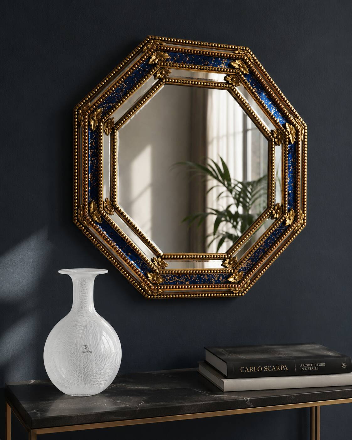 Octagonal wall mirror in cobalt blue eglomisé glass and gilded wood, Spain.