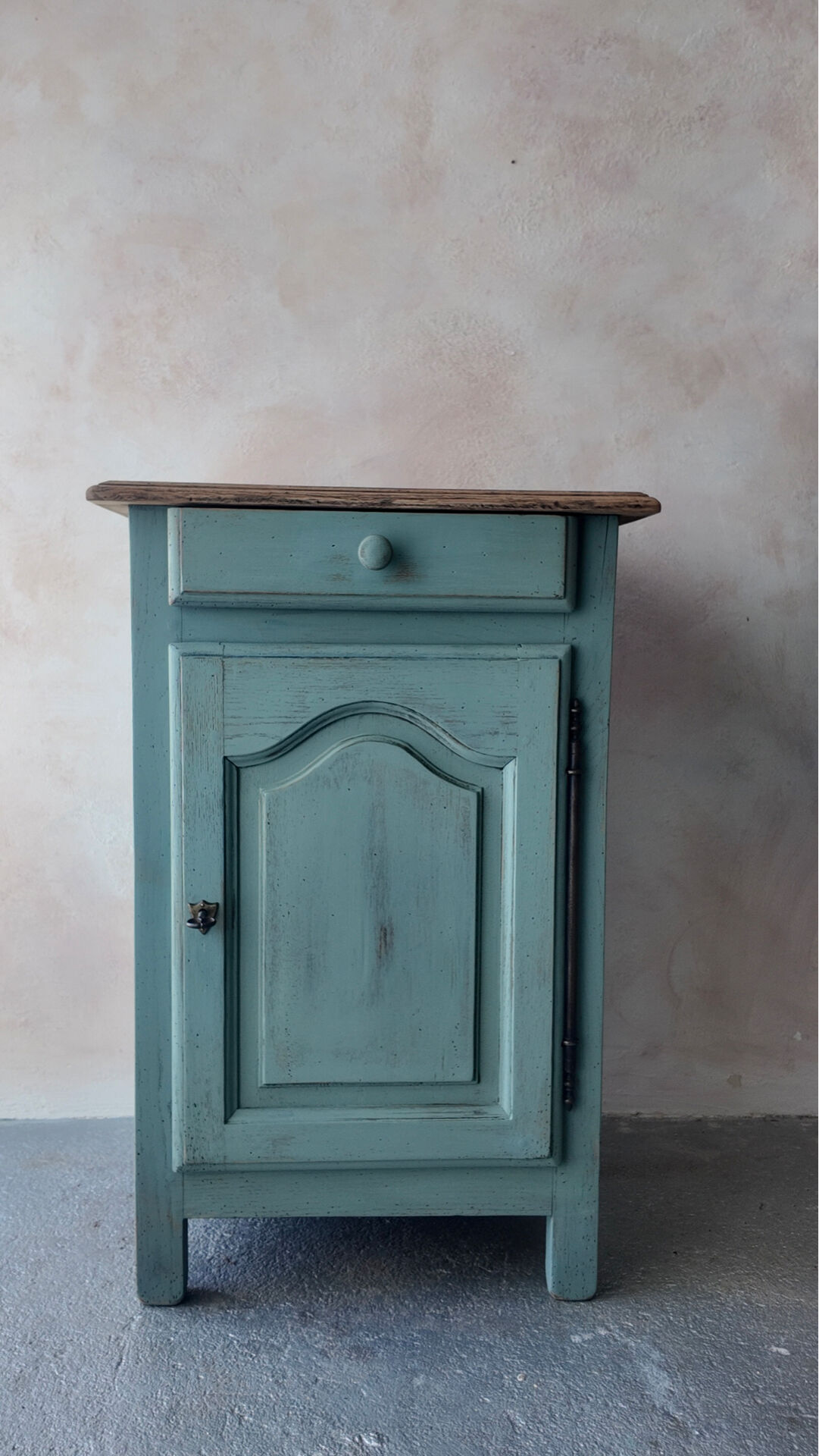 Small vintage side table in sage green patina and solid wood.