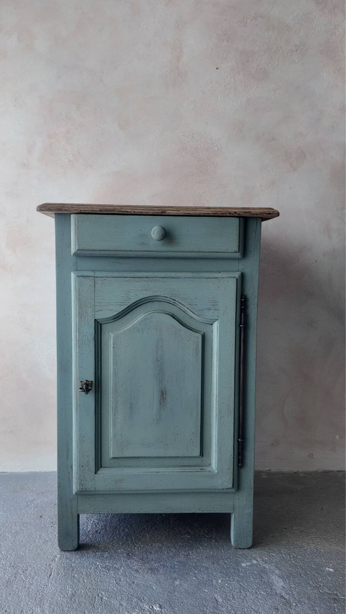 Small vintage side table in sage green patina and solid wood.
