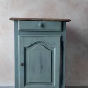Small vintage side table in sage green patina and solid wood.