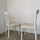 Set of 6 mismatched white chairs