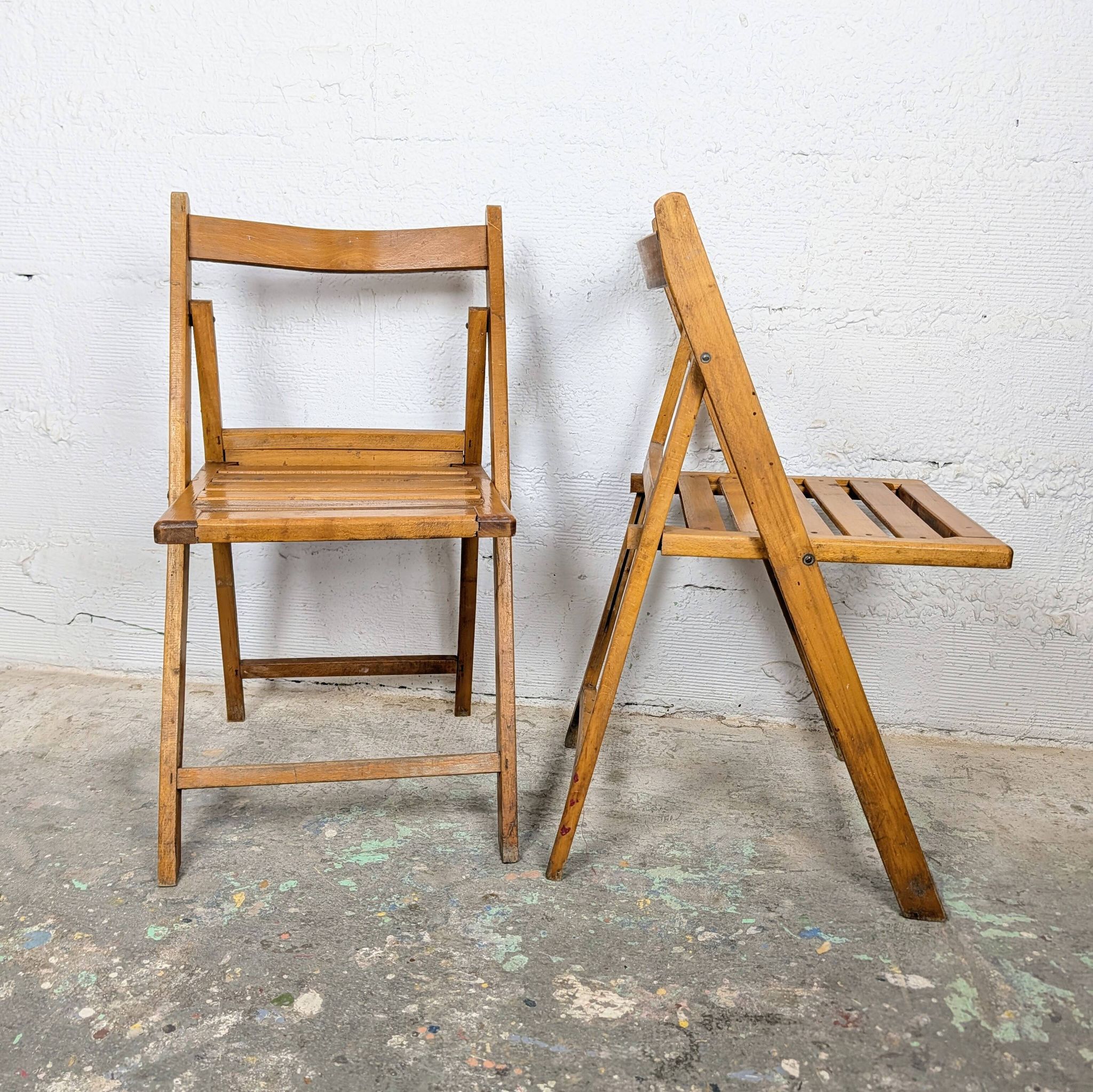 Pair of wooden folding chairs