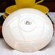 A pair of vintage bright yellow Poole Pottery - Two cups, saucers and ace