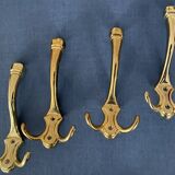 4 golden brass coat racks