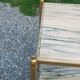 Pair of neoclassical side tables in bronze, brass, marble, and o.