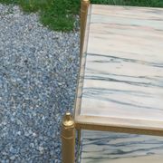 Pair of neoclassical side tables in bronze, brass, marble, and o.