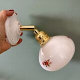 Vintage globe wall sconce in white opaline glass with floral decorations