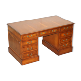 Partner desk with double pedestal in burr yew wood with decorated top.