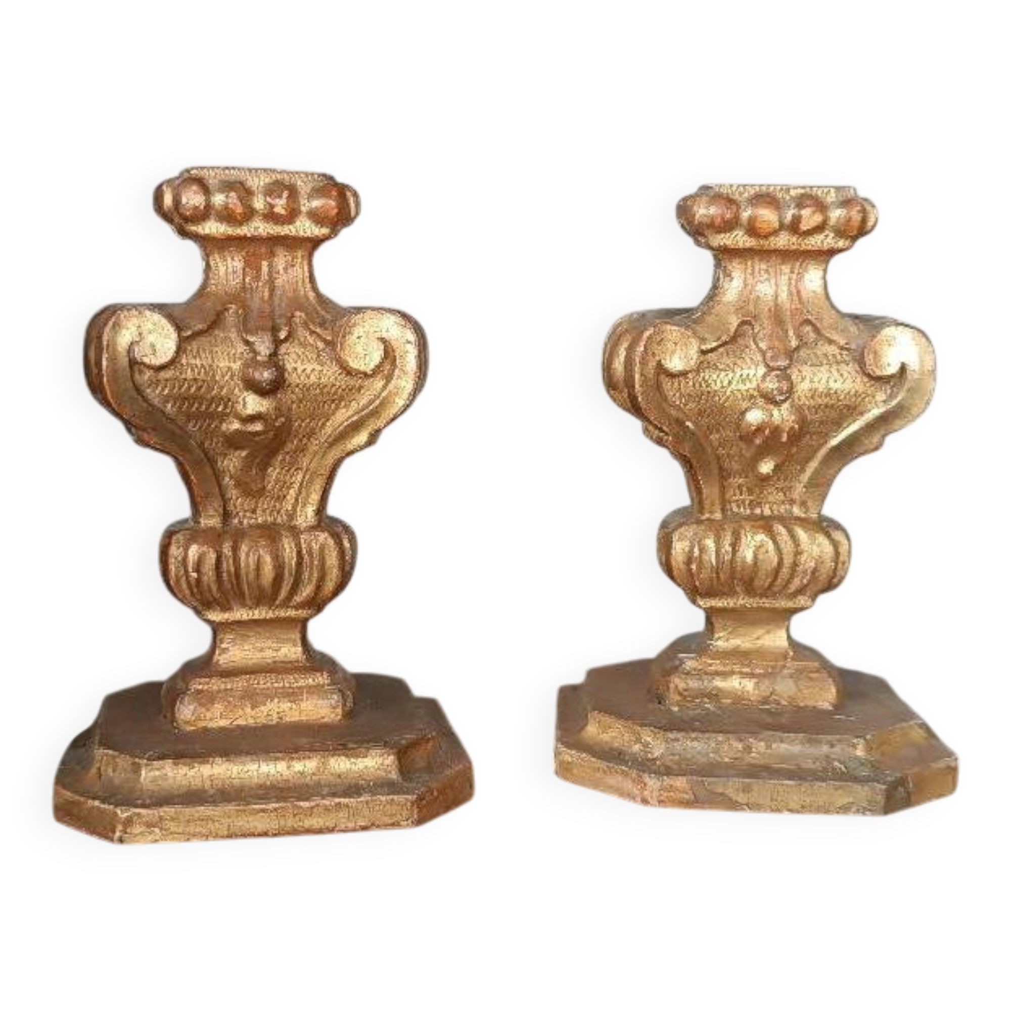 An antique pair of Louis XIV style paddle holders.