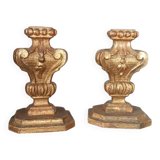 An antique pair of Louis XIV style paddle holders.