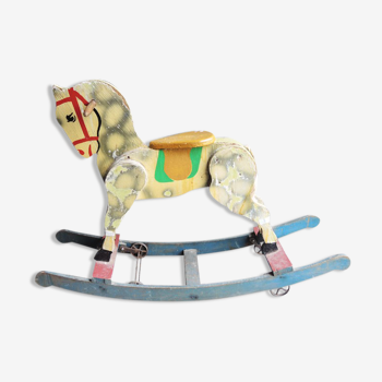 Old painted wooden rocking horse