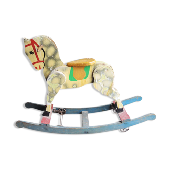 Old painted wooden rocking horse