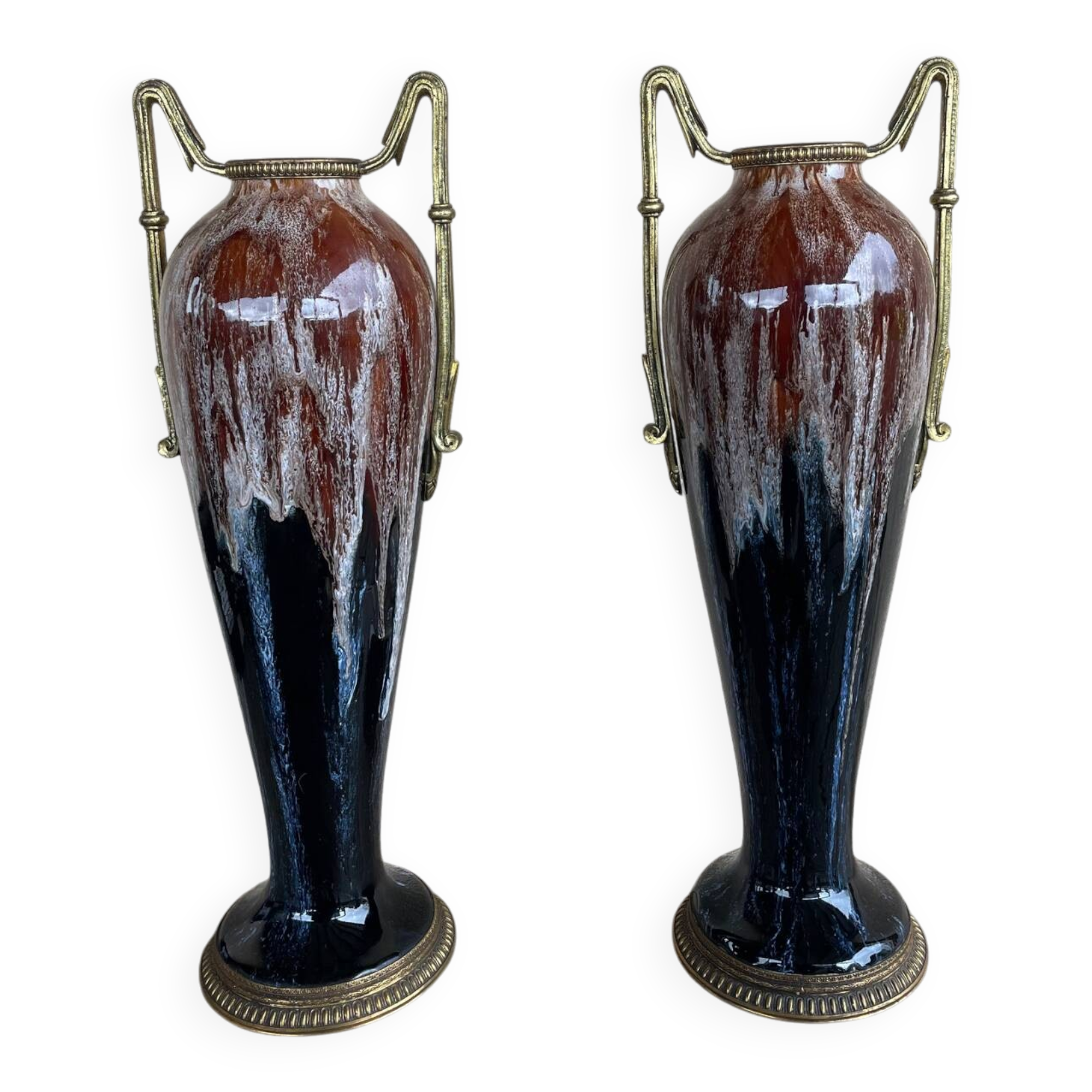 Two large stoneware vases with bronze fittings.