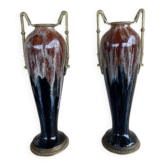 Two large stoneware vases with bronze fittings.