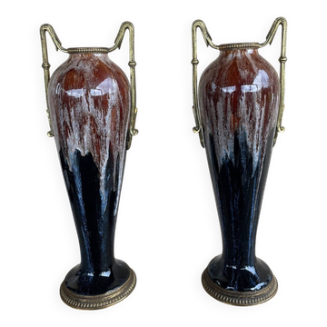 Two large stoneware vases with bronze fittings.