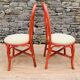Paire de chaises rotin rouge et tissu