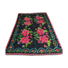 Romanian wool handwoven carpet with large pink flowers on black background